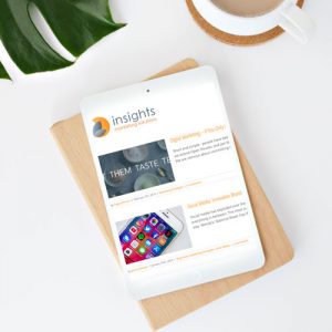 A tablet displays the blog page from Insights Marketing Solutions